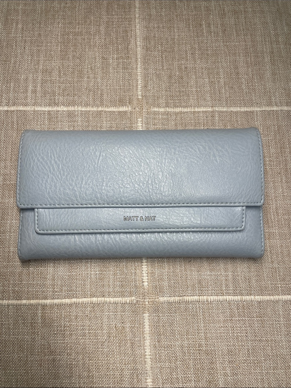 Matt & Nat Light Blue Vegan Leather Textured Flap Wallet Logo